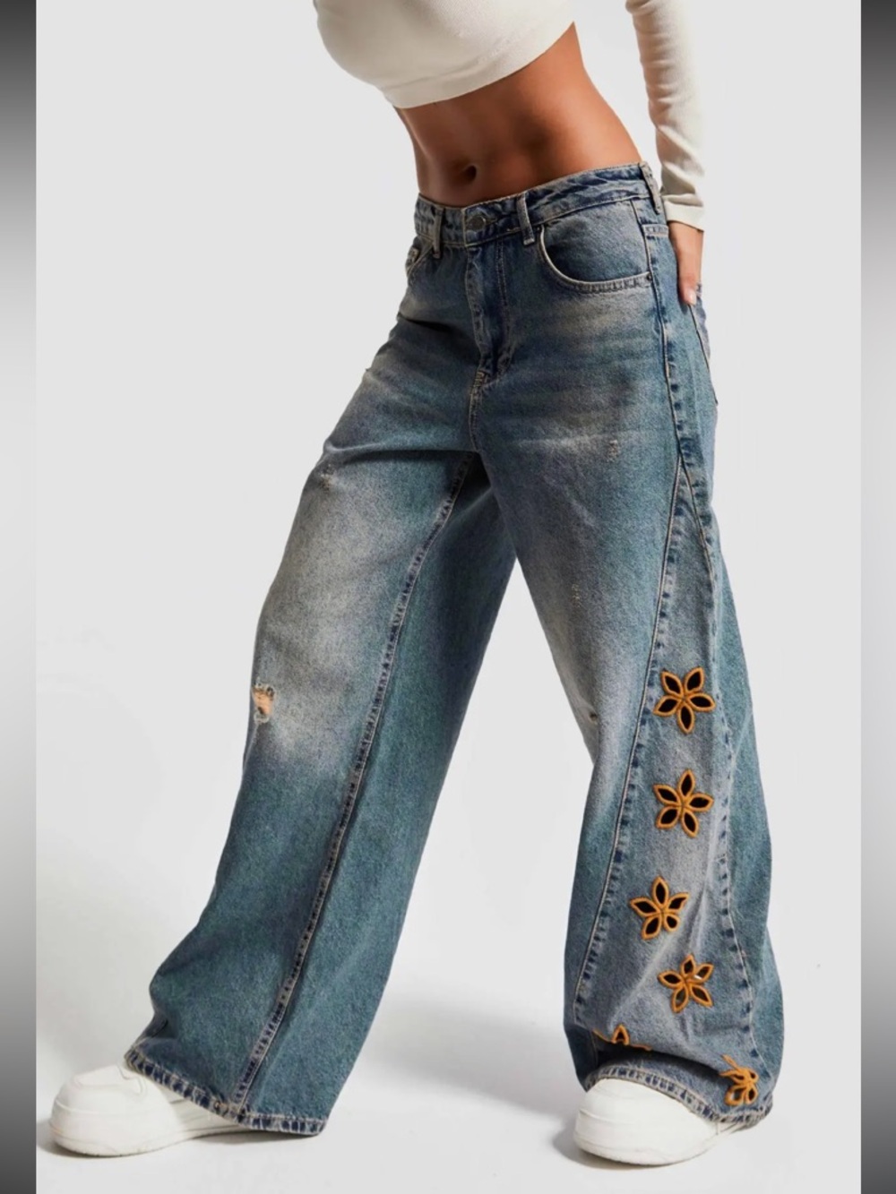 ShopEvelynne Faded Blue Wide-Leg Jeans with Floral Cutouts